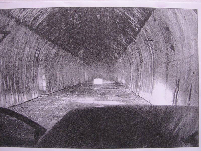 and the rails inside the tunnel are, gallery for ventilation and water draining drilled through by the prisoners, 2 meters high, 2 meters wide and 100 meters long,