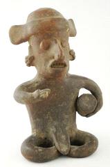 Lot # 415 415 Pre-Columbian carved stone seated figure group,