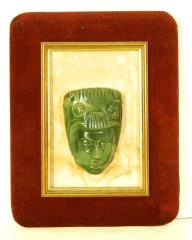 Lot # 496 496 Mayan carved nephrite head mounted on a wall