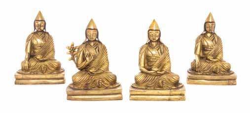 496 496 a Set of Four Sino-tibetan Gilt Bronze Figures of Gelugpa Lamas 19tH CEntUrY each igure seated on a cushion base, wearing voluminous robes and a tall pandita hat, the left hand bearing an