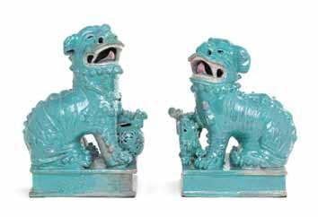 32 33 34 35 36 32 a Pair of robin s Egg Glazed Porcelain Figures of Fu Lions 19tH CEntUrY each animal depicted seated with its head turned and mouth open, the male igure with the left front paw