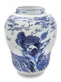 169 170 171 176 169 a Large Blue and White Porcelain Jar 18tH/19tH CEntUrY having broad shoulders and a tapering foot, painted to depict qilin standing on rockery above rushing waves, all below