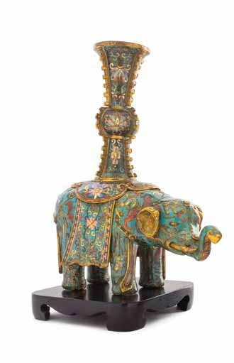 250 251 249 a Pair of cloisonné Enamel Elephant-Form candleholders each animal igure depicted standing with the back covered in a draped cloth surmounted by a