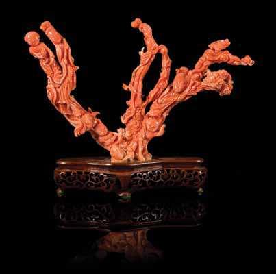 367 366 369 366* a carved Pink coral Figural Group LatE QinG DYnastY/rEPUBLiC PErioD depicting various igures including three standing ladies, two bearing loral sprigs and one holding a musical