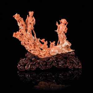 wein, Denver, Colorado $2,000-4,000 367* a carved Pink coral Figural Group LatE 19tH/20tH CEntUrY carved to show a female immortal standing beside a pine tree loating on clusters of clouds, another