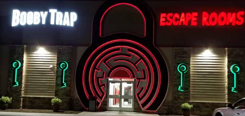A-MAZE-ING RGB Sign Dimensions: 28 x 22 6 tall keys MATT GARVES LA CROSSE SIGN GROUP The owners of a new business called Booby Trap Escape Rooms approached us about their exterior signage needs.