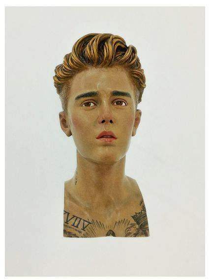 Bieber s head and body parts were sculpted by one of our local santo makers, Willy