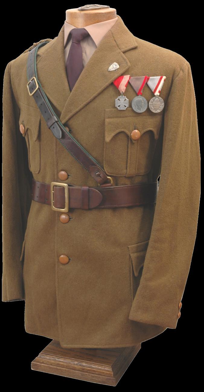 Below: Private Ferenc Kemences s uniform tunic, made from good quality, heavy wool, lined with dark green cotton. Each of the cuffs have two buttons and the pocket flaps are dramatically scalloped.