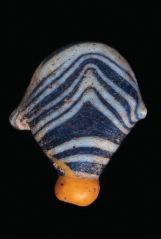 Roman pendant in cobalt blue glass, the miniature pitcher with a wide zigzag band forming a cage around the central core, a single handle extending from shoulder to lip.