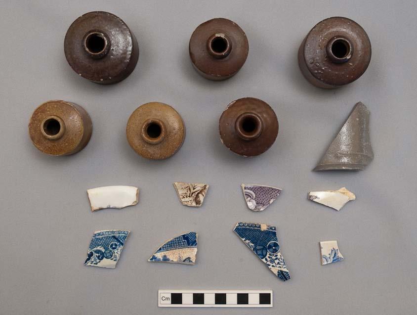 315 Figure 5.46: Ceramics in cesspit 7418 (fill 7459). The six salt-glazed stoneware penny ink bottles are the most dominant item in the cesspits artefact assemblage (#73333-#73338).