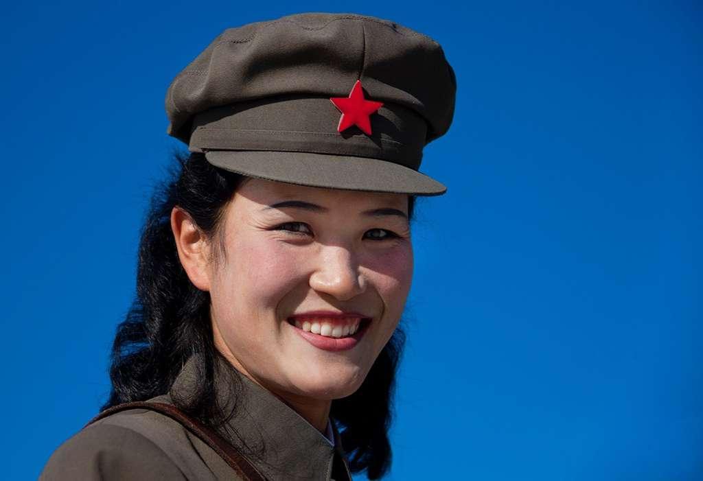 The cap is an integral part of the fashion in North Korea. Almost all the uniforms include it.