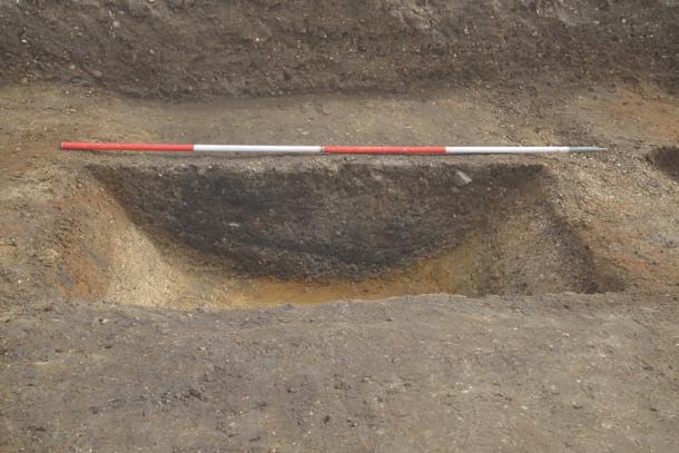 b) Photograph showing northern end of Trench 2,