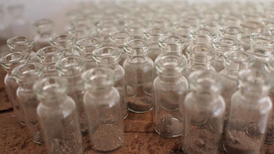 Dust collection in glass vials DUST I collected dust from various places and objects such as: Long Bien bridge, the first steel bridge in Ha Noi that was built by the French in 1887, a bomb shelter