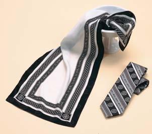 Black and white alternate thoughout the tie in stripes of texture, pattern and color. Unit Price $33.95 Buy 3 $31.95 ea. Buy 6 $29.95 ea. Buy 12+ $27.95 ea. E.
