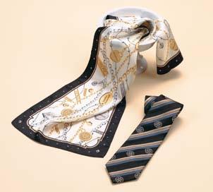 RSS35 Printed Silk Scarf Black/Khaki/White chains & charms scarf on a basketweave jacquard. Unit Price $31.95 Buy 3 $30.35 ea. Buy 6 $28.75 ea. Buy 12+ $27.15 ea. D.