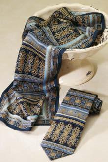 114 Russell-Hampton Company APPAREL A. RSS19 Printed Silk Scarf Multiple shades of blue and gold. Unit Price $31.95 Buy 3 $30.35 ea. Buy 6 $28.75 ea.