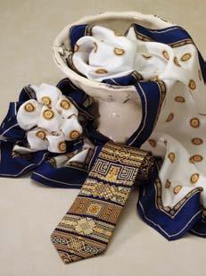 Scarf/Tie detail C. RSS2 Traditional Pattern Silk Scarf White / Navy / Gold. 11 x 54 Unit Price $31.95 Buy 3 $30.35 ea. Buy 6 $28.75 ea. Buy 12+ $27.15 ea. D.