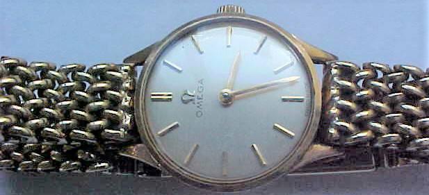 JEWELLERY CABINET 311 1930'S OMEGA STOP WATCH 312 9CT LADIES