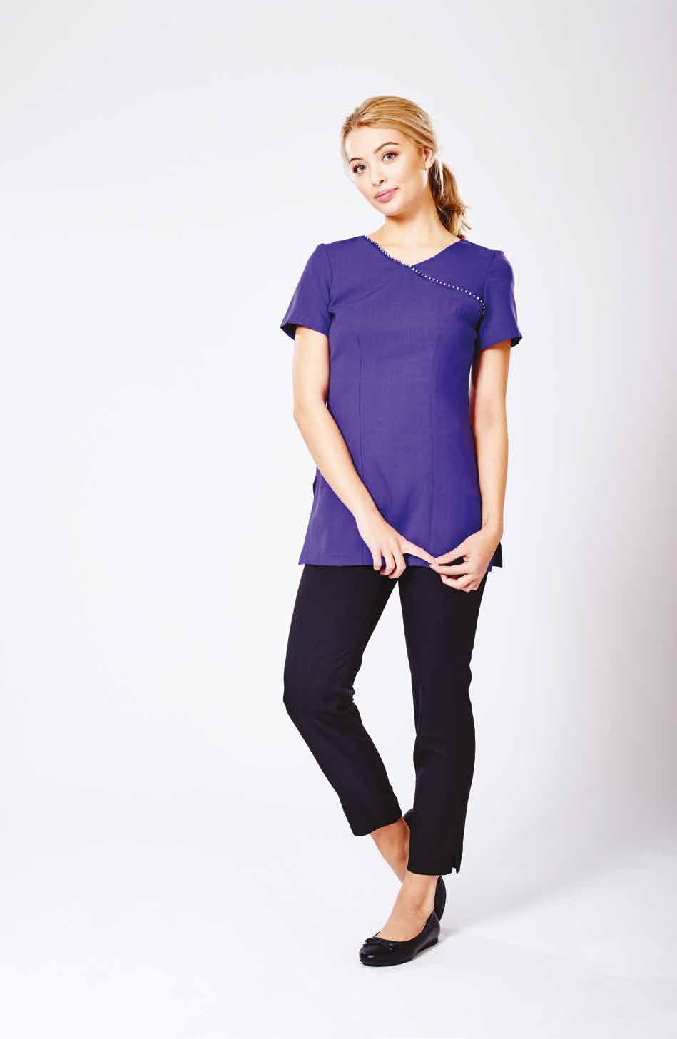 ALICE Brighten up your workwear with this tunic featuring splashes of