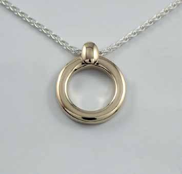 20mm H x 16mm W $240 (Sterling silver with chain)