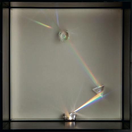 ALBERTO BIASI (Padua 1937) Light Prism, 1964 Prisms, light, electrical motors, mirrors, and wood 50 x 50 x 50 cm.
