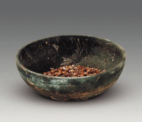 1 Earthenware bowl (M1:6, it contained empty hulls of barley when it was excavated)