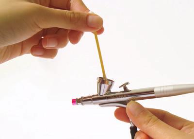 CLEANING YOUR NEEDLE Occasionally, it is recommended to clean the stylus needle to ensure the Airbrush Look