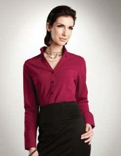70% polyester / 27% nylon / 3% spandex long sleeve woven pullover blouse.