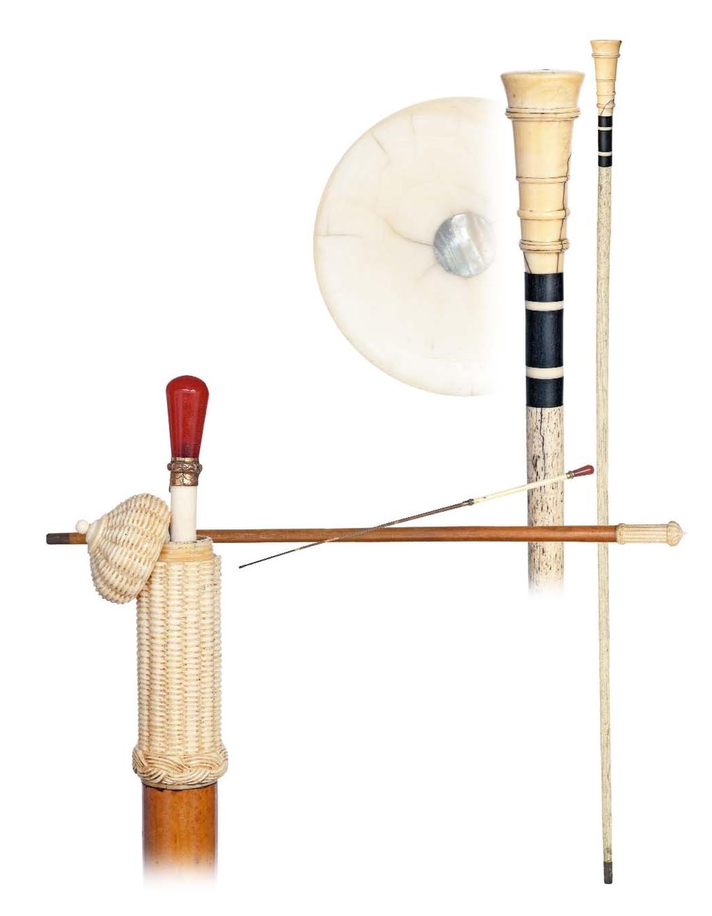 15. Whalebone Nautical Cane New England, circa 1865-A long and tapering sperm whales tooth ivory handle turned with multiple rings and set at the top with an abalone shield on a whale bone shaft with
