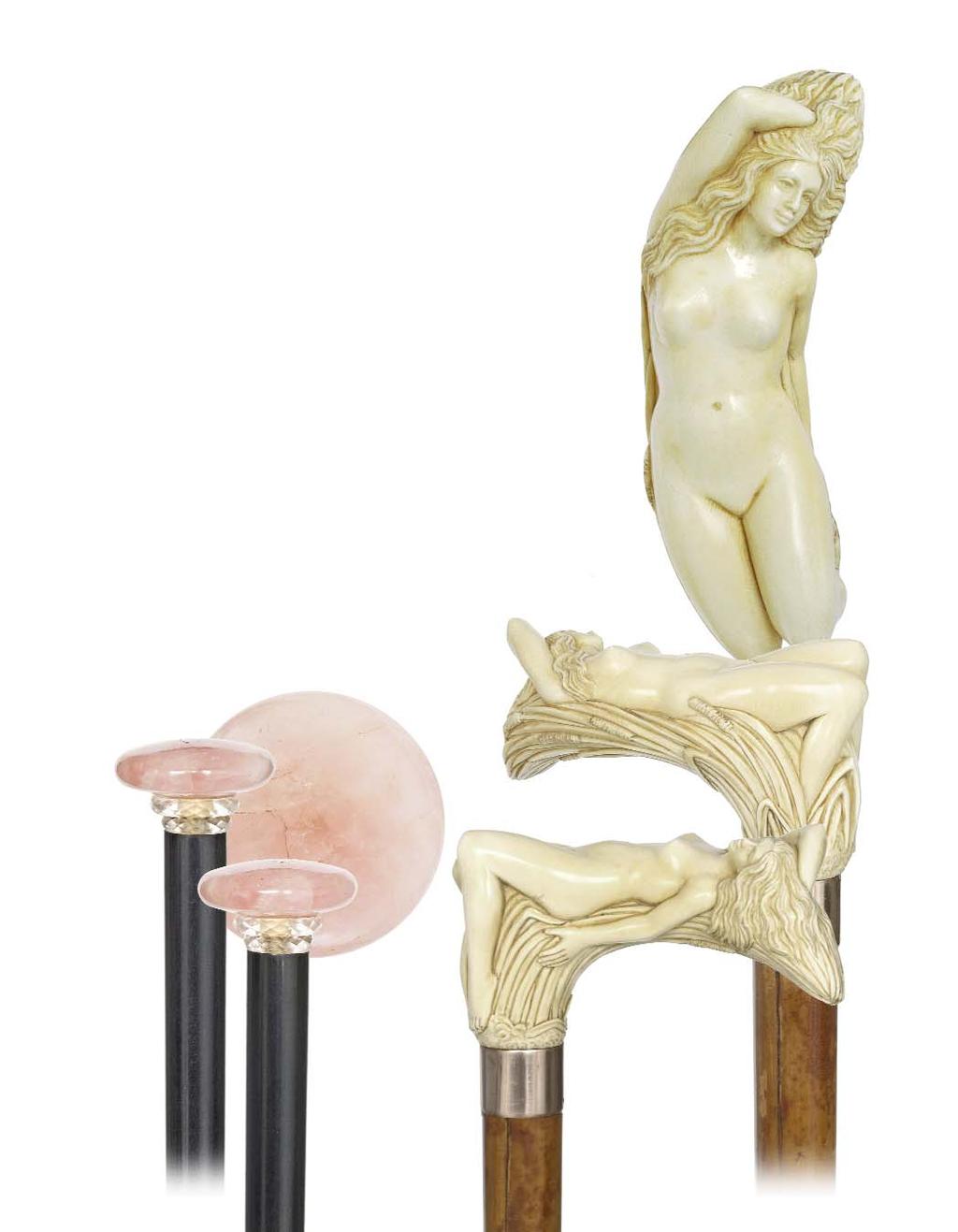 47. Erotic Ivory Dress Cane Circa 1890, European most likely French-A museum quality carving of a nude lady, gracefully reclining on reeds with a folded right arm behind the head, exposing all the