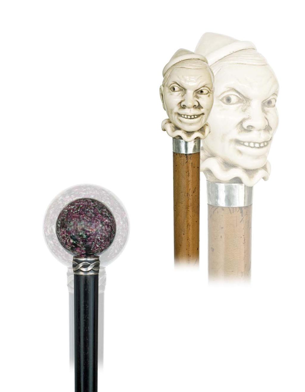 59. Ivory Pierrot Cane Sizeable ivory head with a smiling face, frill collar and bonnet, full bark malacca shaft with silver collar and a horn ferrule.