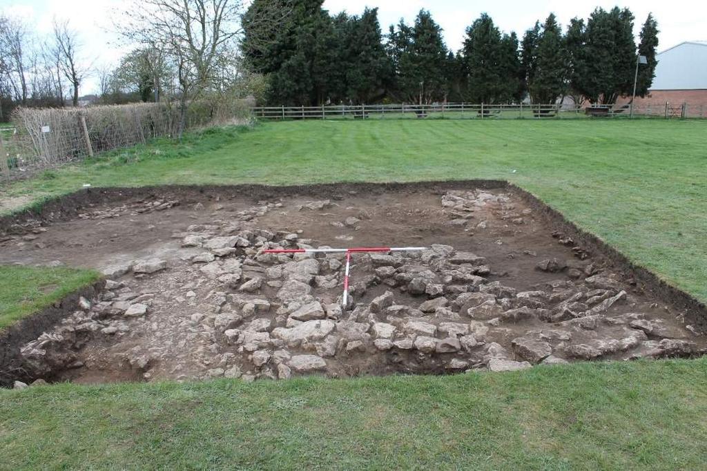 Plate 10: The excavation area after initial cleaning. Looking north, 2 x 2m scales 8.0 Discussion 8.1 The excavation revealed a complex series of remains, dating almost entirely to the Roman period.