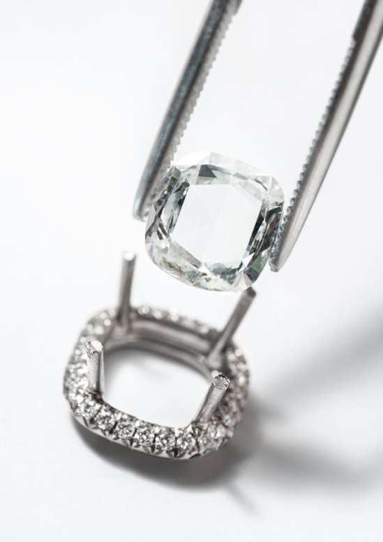 Setting a rose-cut diamond Winter Sun Watch Case in 18K white gold set with 24 marquise-cut diamonds (approx. 3.