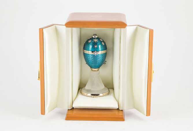 62 DUNBAR SLOANE 1227 Faberge 18ct Gold, Enamel & Diamond Ice Bear Egg the egg is made of 18kt white gold covered with multiple layers of turquoise enamel on a guilloche ground, the egg is