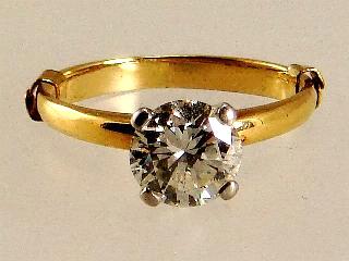 Lot # 447 447 14kt yellow & white gold diamond solitaire ring, 1.