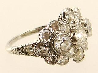 $175 - $225 $1,800 - $2,000 Lot # 476 476 Platinum and diamond ring.