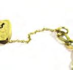 yellow metal fi ne curblink necklace suspending ng a Maltese cross and a metalware