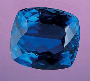 BERYL, Treated Color Last fall, the East Coast lab was asked to identify the 16.40 ct violetish blue cushion-shaped stone shown in figure 2, which was being sold as a tanzanite simulant.