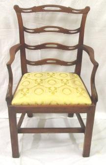 with whaled backs, bow fornted upholstered seats, on square tapering legs with splayed feet, including two carver