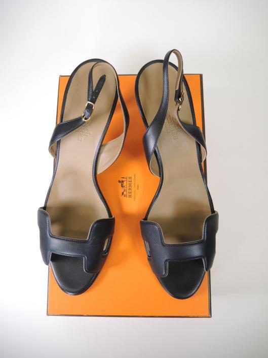 HERMÈS Black Leather Night 70 Sandal, Size 9 Retailed for $880, sold in one day for $399. 04/21/18 Have the trademark belt, bangle, and bag?
