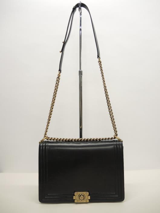 CHANEL 2011 BLACK Large Boy Flap Bag Retailed for $4,800, sold in one day for $2,600. 04/14/18 Invest in yourself and indulge in this black lambskin flap bag with the signature Boy hardware.