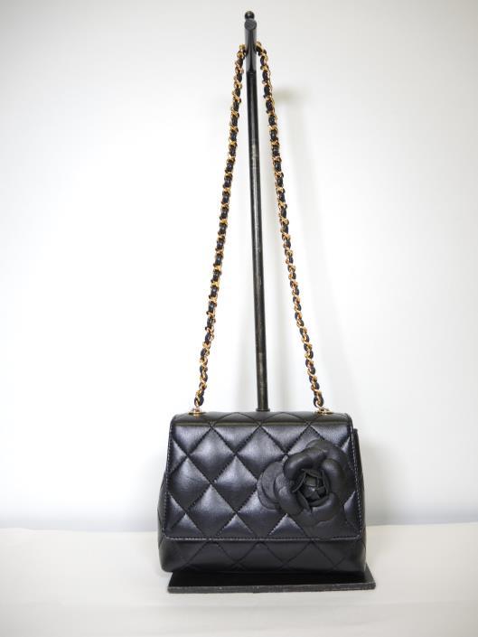 CHANEL 1998 Black Rosette Petite Shoulder Bag Sold in one day for $699. 02/03/18 Micro sized but majorly adorable. This compact leather shoulder bag is from 1998 and is a lovely evening accessory.