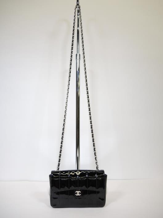 CHANEL 2000 Patent Convertible Shoulder or Belt Bag Sold in one day for $649. 02/03/18 Check out this convertible and compact purse from French fashion icon Coco Chanel.