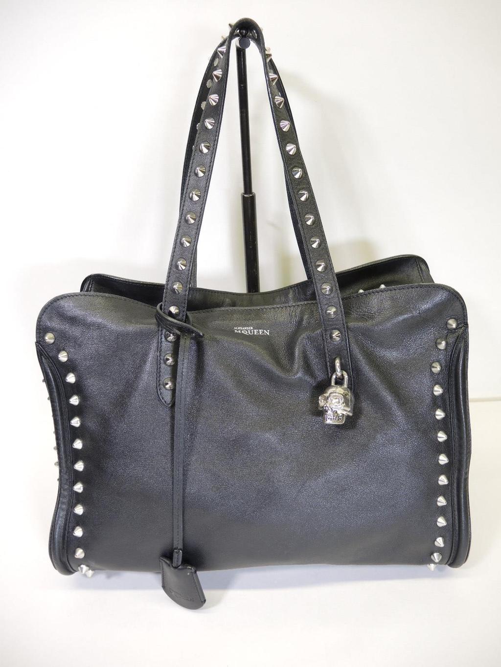 ALEXANDER McQUEEN Black 'Medium Studded Skull Padlock Tote' Retailed for $1995, sold in one day for $699.