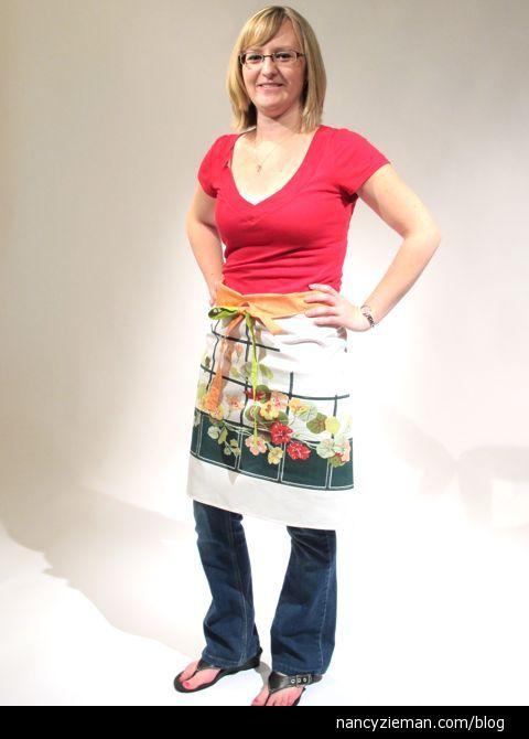 Add patch pockets to the sides of the apron either on the front, with the print blending with the tablecloth print, or on the back with only