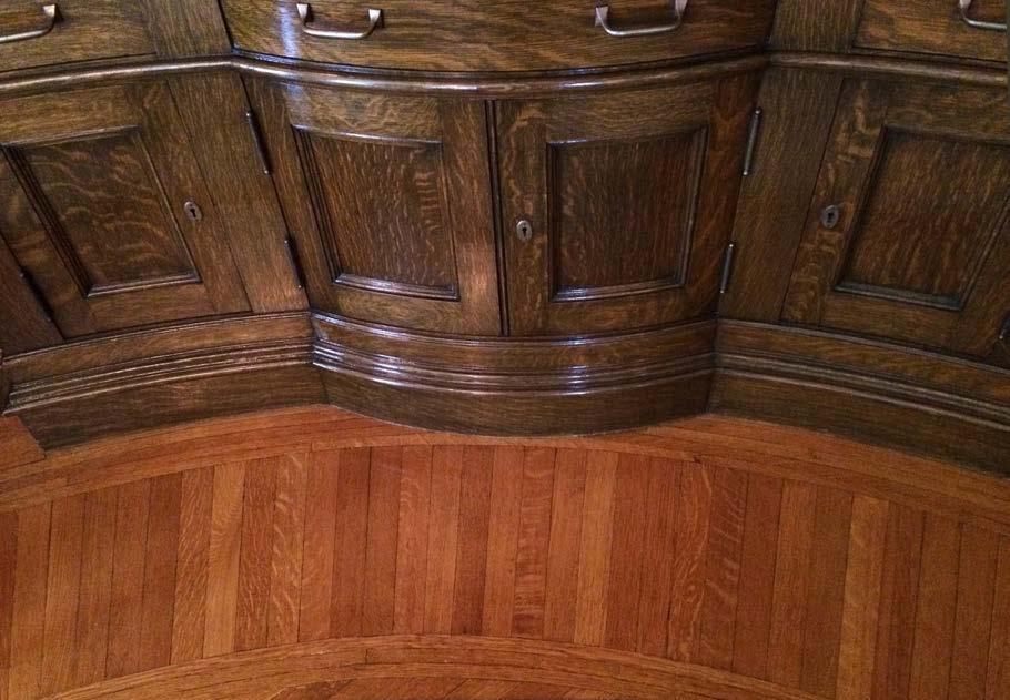 The circular pattern of the beautiful hardwood floor in the