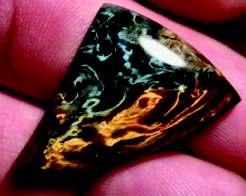 JULY 2012 (Continued from page 2) In 1979, a major deposit of gem-quality sugilite was found in a Wessels mine (manganese) in the Southern Khalahari desert in South Africa.