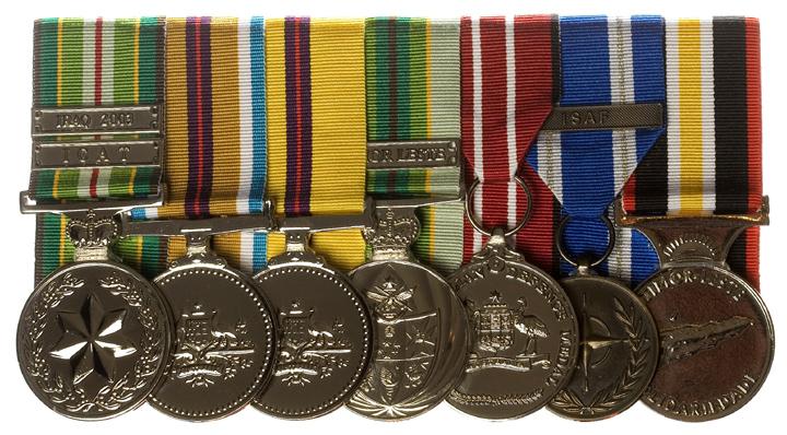 6E 3 Figure 6E 3 Seven full size medals court mounted with ribbon overlap 11.