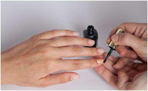 Apply the second colour at the tip of the nail, either with