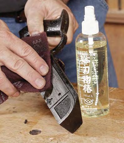 Make sure to work the solvent over every part of the tool. Soak small parts in a container, and use a bristle brush where necessary.